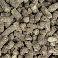A close-up of Choc Nibbs, which are crunchy, chewy, and covered in creamy chocolate. Choc nibbs 100g chocolate coated biscuit toffee and nut pieces